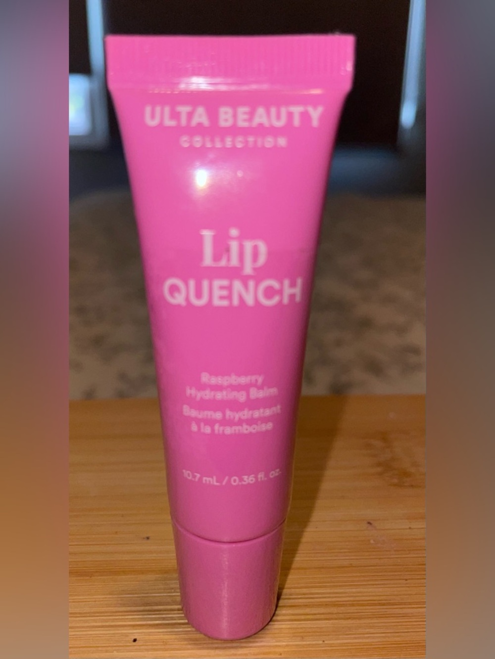 Ulta brand 'Lip Quench' lip gloss in Raspberry hydration balm
